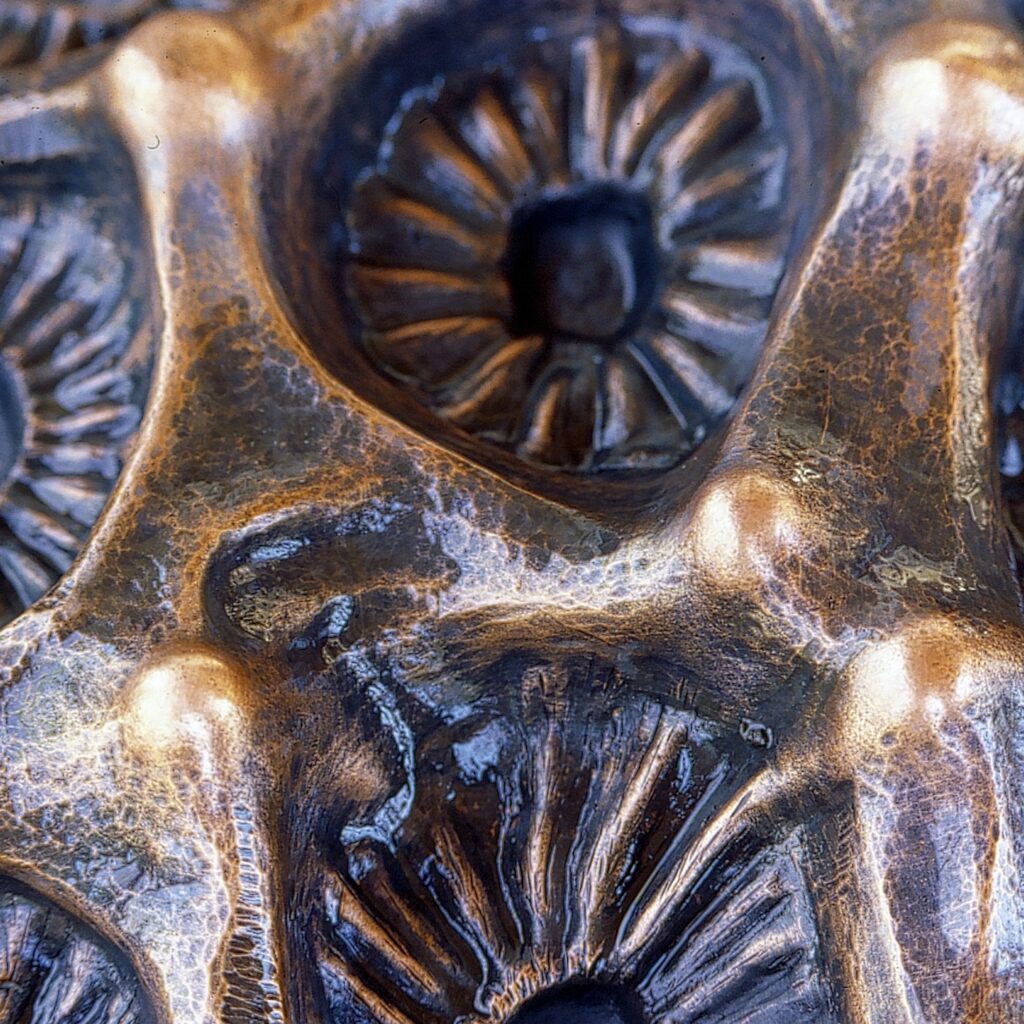 repousse copper wall sculpture close 2