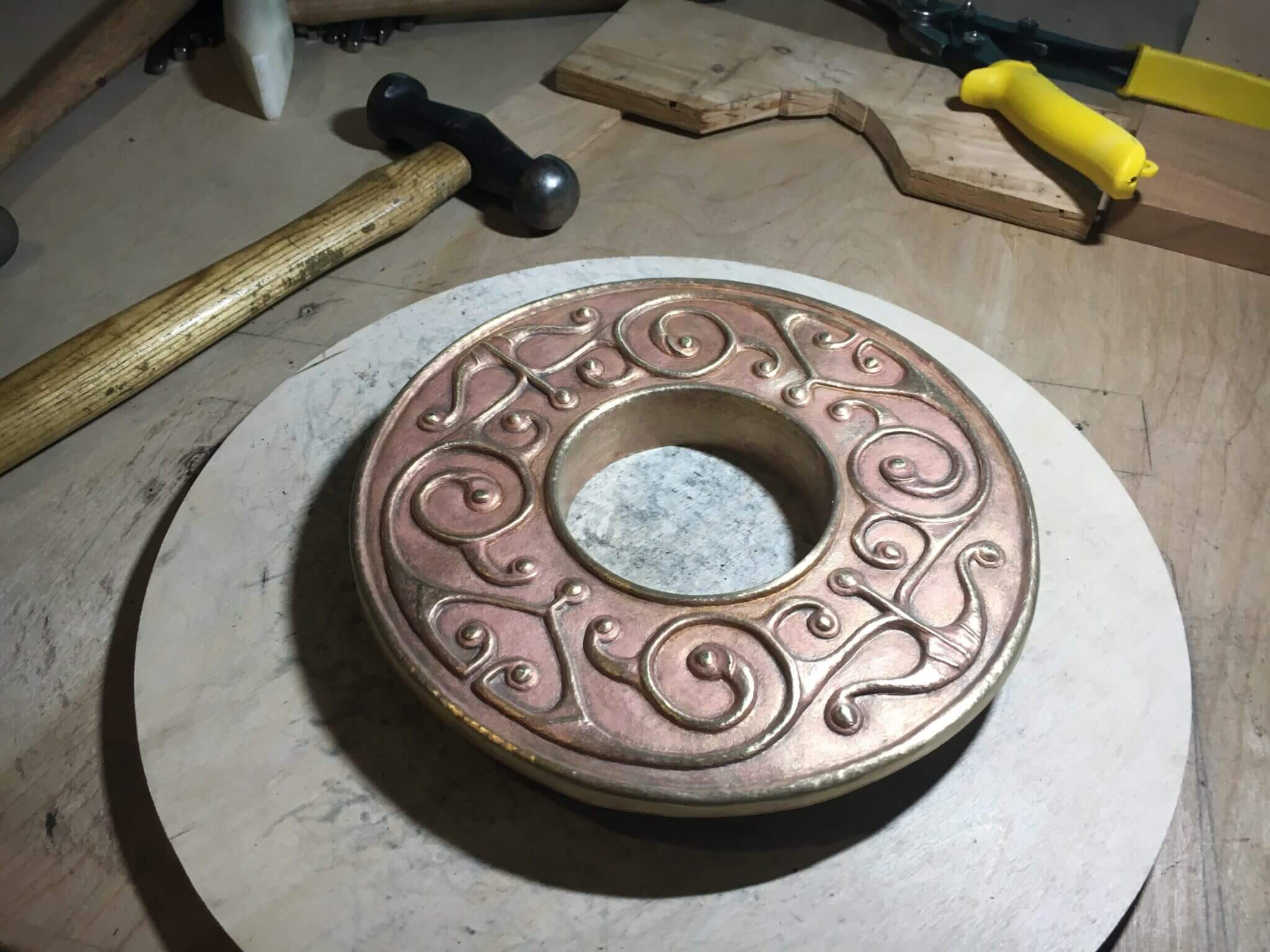 brass repousse relief art