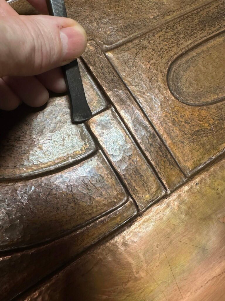 chasing copper sculpture relief design