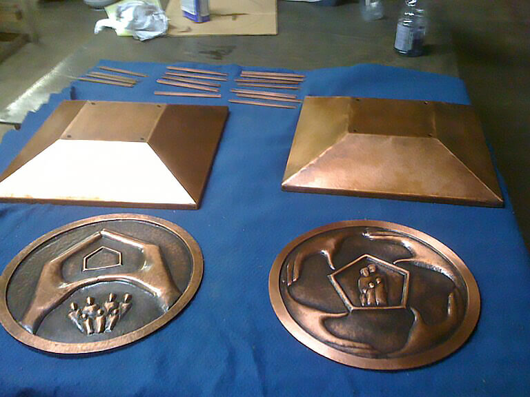 copper medallions and caps