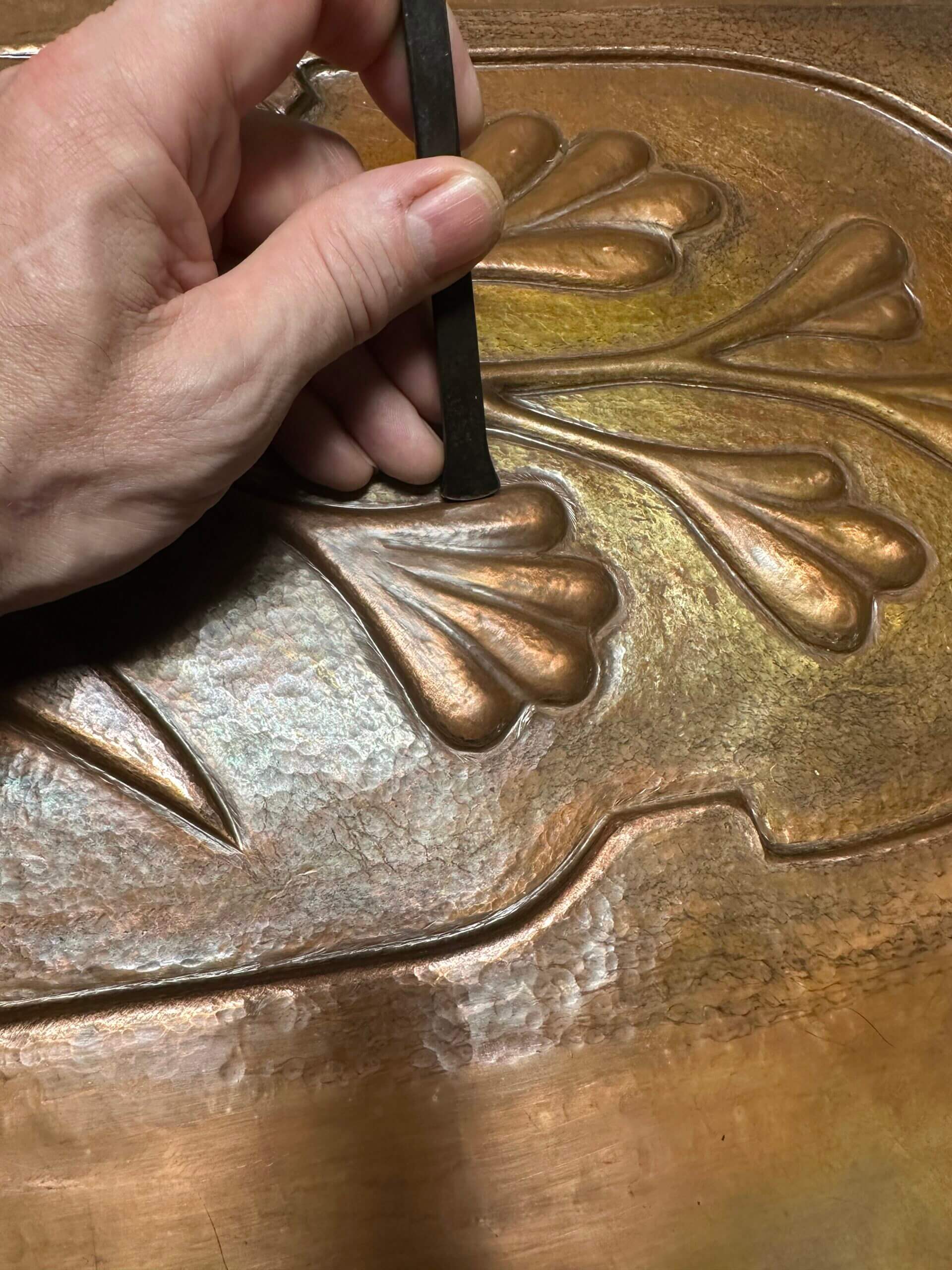 copper sculpture repousse close up