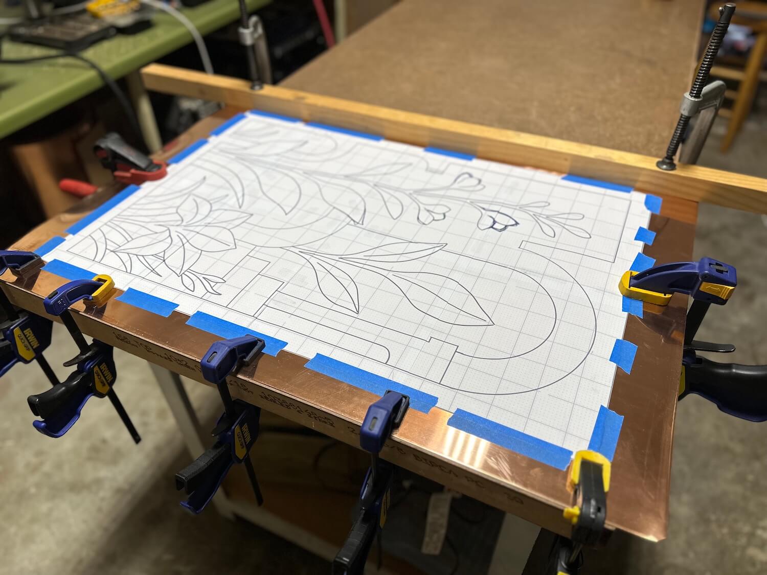 design drawing on copper sheet