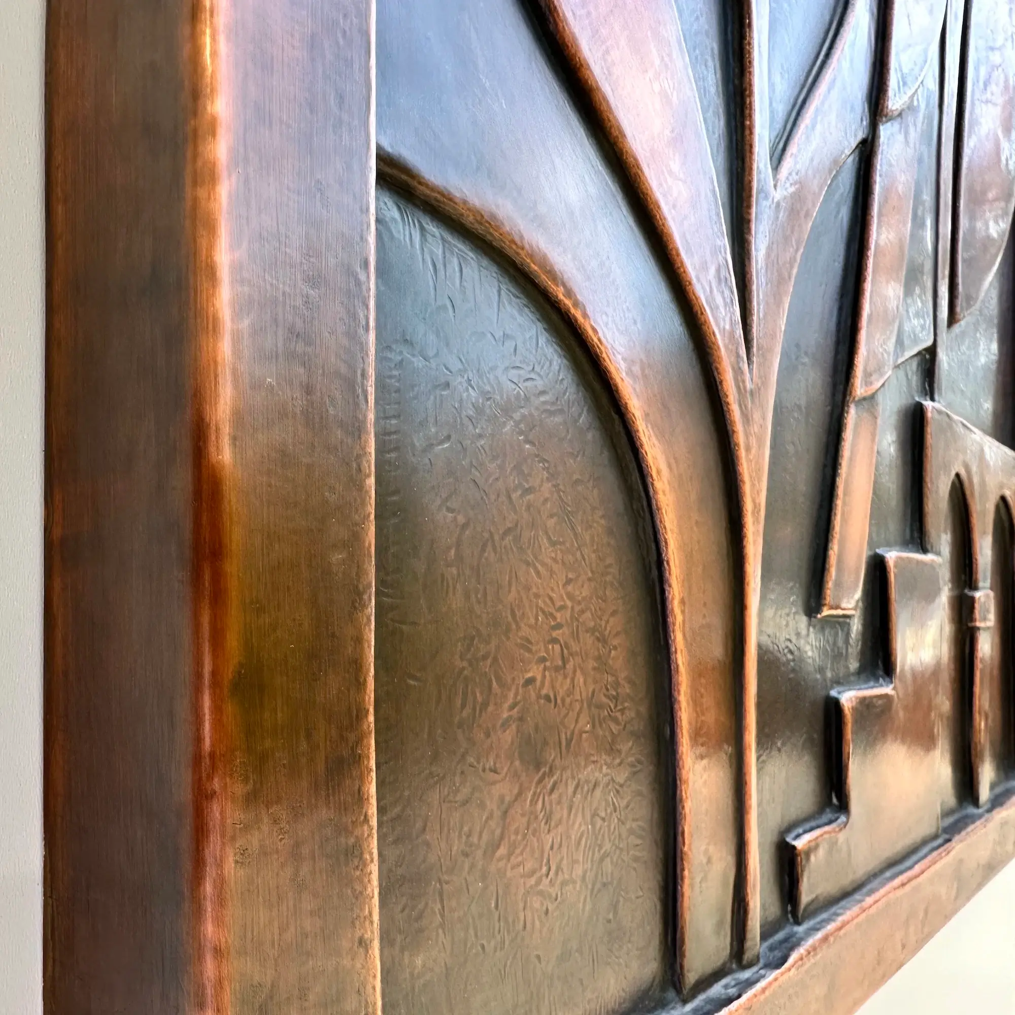 metal owl wall art sculpture close up angled side